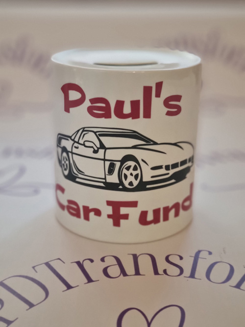 ceramic money box with Paul's Car fund motive